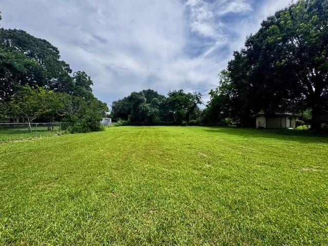 2803 Horn Rd, Bay City, TX 77414 - view of yard featuring a storage unit