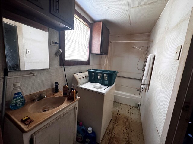 2803 Horn Rd, Bay City, TX 77414 - laundry room featuring washer / dryer and light flooring