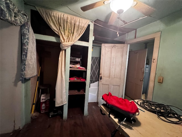 2803 Horn Rd, Bay City, TX 77414 - bedroom with wood finished floors and ceiling fan