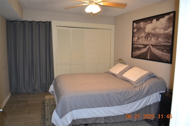 5100 Milwee St Unit 142, Houston, TX 77092 - bedroom featuring a closet and ceiling fan
