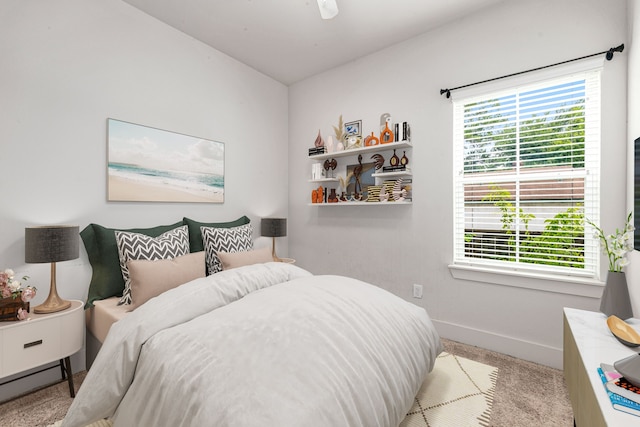 6033 Cypress St, Houston, TX 77074 - carpeted bedroom featuring baseboards