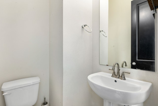 6033 Cypress St, Houston, TX 77074 - half bath with a sink and toilet