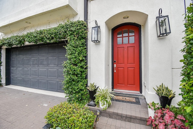 2230 Lakeshore Edge Dr, Houston, TX 77080 - property entrance featuring stucco siding and a garage