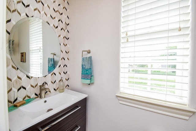 2230 Lakeshore Edge Dr, Houston, TX 77080 - bathroom with vanity and tasteful backsplash
