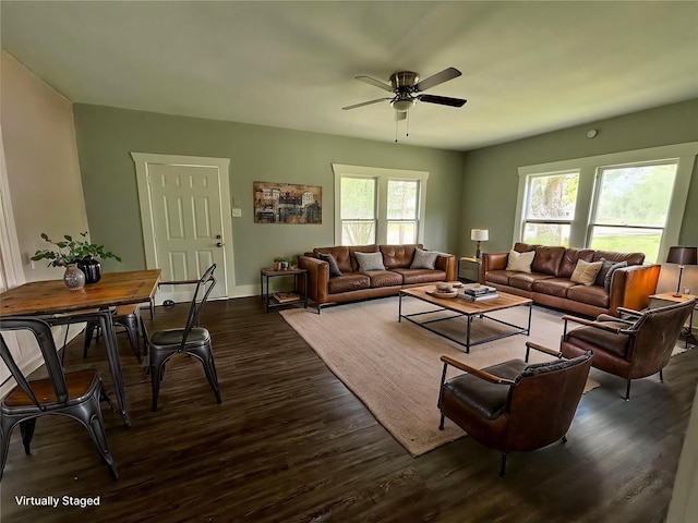 716 Olive St, Wharton, TX 77488 - living area with a ceiling fan and dark wood-style flooring