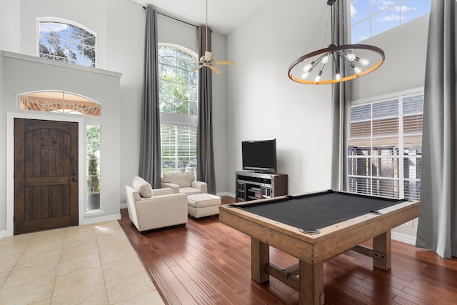 3423 Velasco Ct, Missouri City, TX 77459 - game room with a towering ceiling, billiards, a chandelier, and wood-type flooring