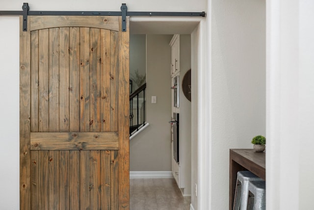 3423 Velasco Ct, Missouri City, TX 77459 - corridor with a barn door