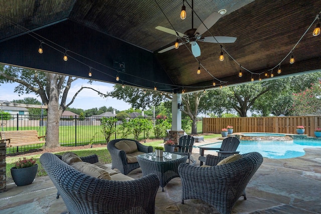 3423 Velasco Ct, Missouri City, TX 77459 - fenced backyard with a ceiling fan, a patio area, an in-ground hot tub, and an outdoor hangout area