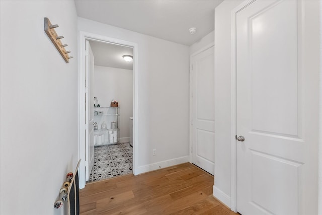 10059 Preserve Way, Conroe, TX 77385 - hallway with light wood-style floors and baseboards