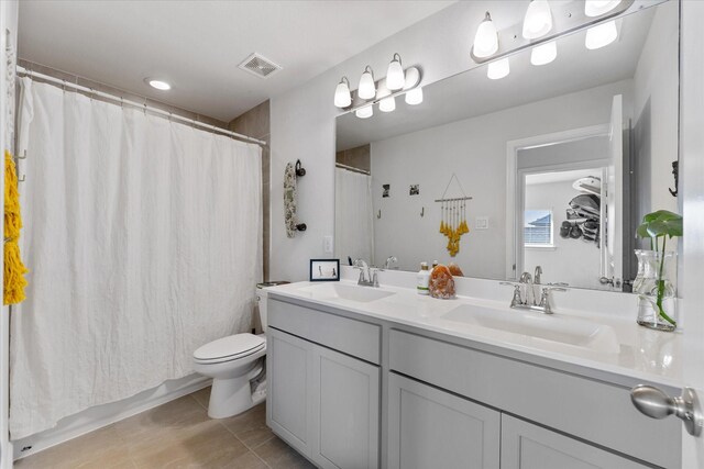 10059 Preserve Way, Conroe, TX 77385 - bathroom featuring double vanity, tile patterned floors, and a shower with shower curtain