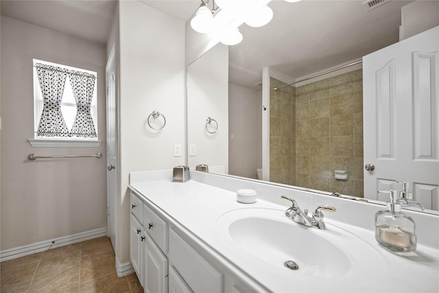 18815 Manleigh Ct, Tomball, TX 77377 - bathroom with vanity, a shower, and tile patterned floors
