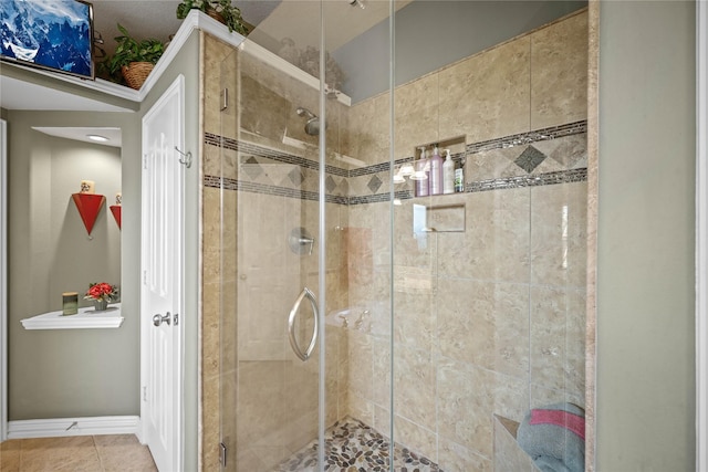 18815 Manleigh Ct, Tomball, TX 77377 - full bath featuring a stall shower and tile patterned floors