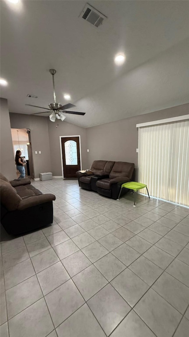 6018 Beaconridge Dr, Houston, TX 77053 - living area featuring lofted ceiling, light tile patterned floors, and ceiling fan