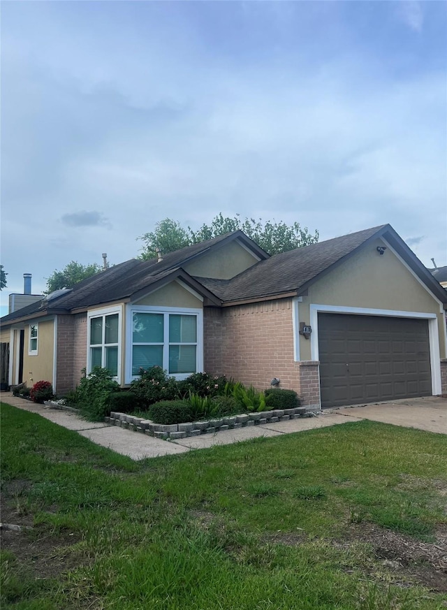 6018 Beaconridge Dr, Houston, TX 77053 - single story home featuring brick siding, a garage, concrete driveway, and a front lawn
