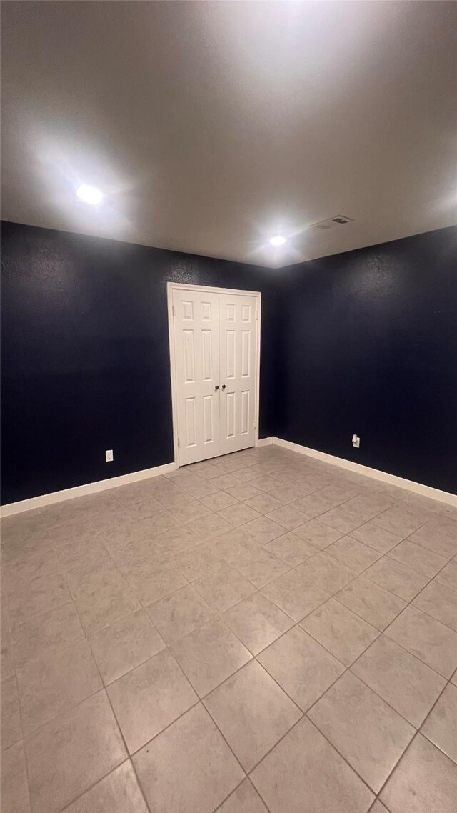 6018 Beaconridge Dr, Houston, TX 77053 - unfurnished room featuring light tile patterned flooring and baseboards