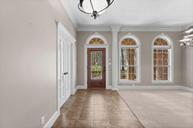11510 Walden Rd, Montgomery, TX 77356 - entrance foyer featuring a chandelier and ornamental molding