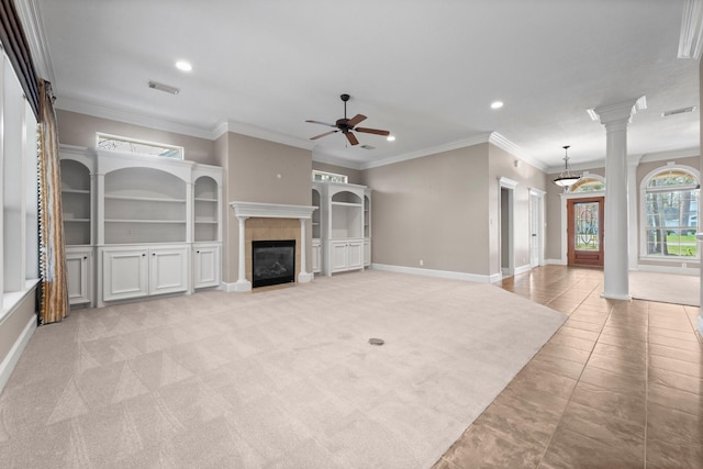 11510 Walden Rd, Montgomery, TX 77356 - unfurnished living room featuring recessed lighting, ceiling fan, a tile fireplace, ornamental molding, and light tile patterned floors