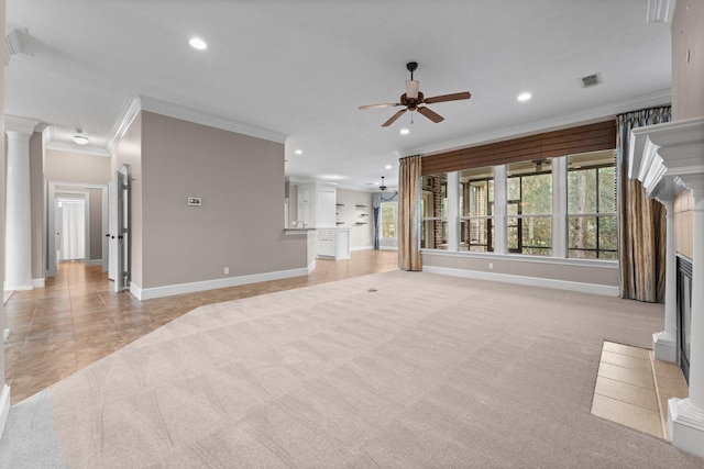 11510 Walden Rd, Montgomery, TX 77356 - unfurnished living room featuring ornamental molding, ceiling fan, light colored carpet, a fireplace with flush hearth, and recessed lighting