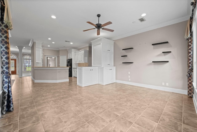11510 Walden Rd, Montgomery, TX 77356 - unfurnished living room with ornamental molding, ceiling fan, recessed lighting, ornate columns, and light tile patterned floors