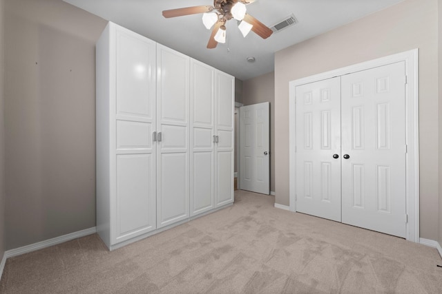 11510 Walden Rd, Montgomery, TX 77356 - unfurnished bedroom featuring light colored carpet, a ceiling fan, and a closet