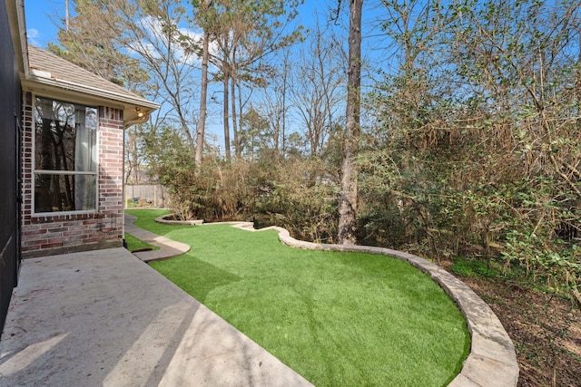 11510 Walden Rd, Montgomery, TX 77356 - view of grassy yard featuring a patio