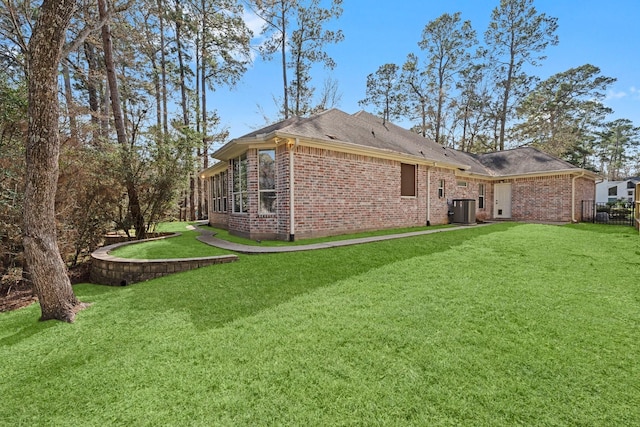 11510 Walden Rd, Montgomery, TX 77356 - rear view of house featuring brick siding
