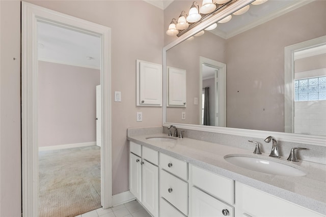 3908 Milton St, West University Place, TX 77005 - bathroom featuring double vanity, crown molding, and tile patterned floors