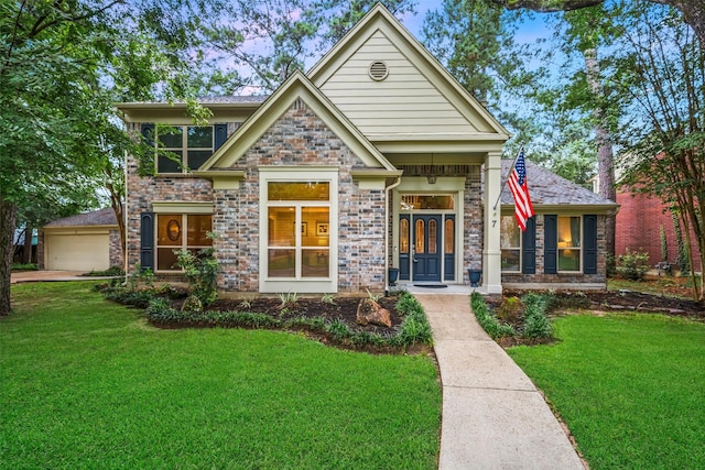 7 Bending Branch Pl, Spring, TX 77381 - view of front of property featuring a front yard, stone siding, and driveway