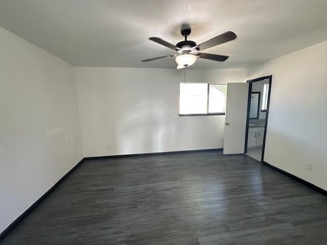 9009 Imogene St Unit E, Houston, TX 77036 - unfurnished room with ceiling fan and wood finished floors