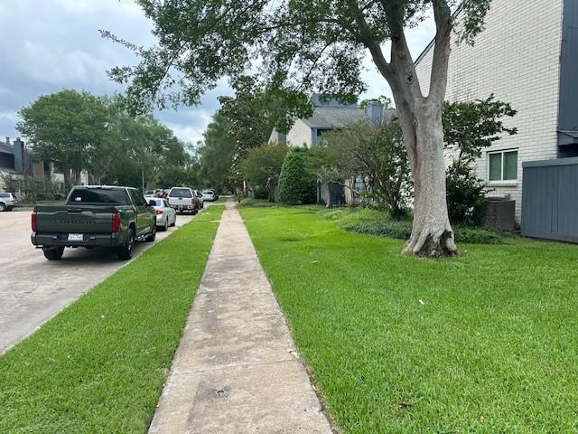 9009 Imogene St Unit E, Houston, TX 77036 - view of road with sidewalks