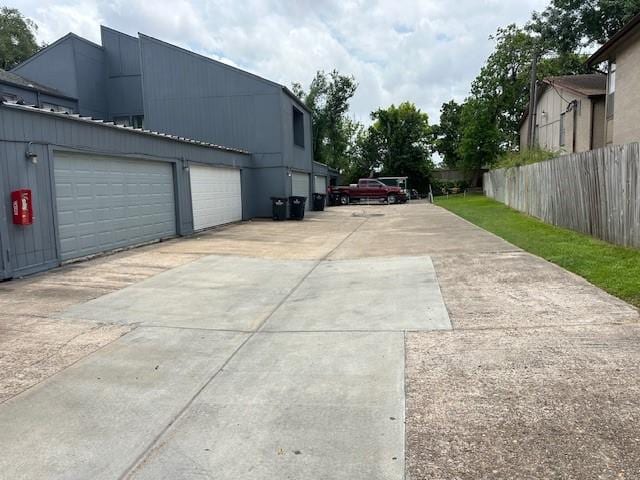 9009 Imogene St Unit E, Houston, TX 77036 - view of property exterior with concrete driveway