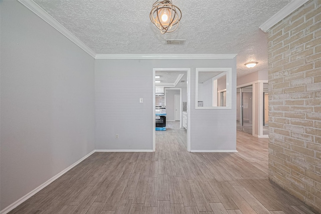 10423 Rancho Bernardo Ln, Sugar Land, TX 77498 - unfurnished room featuring wood finished floors and a textured ceiling