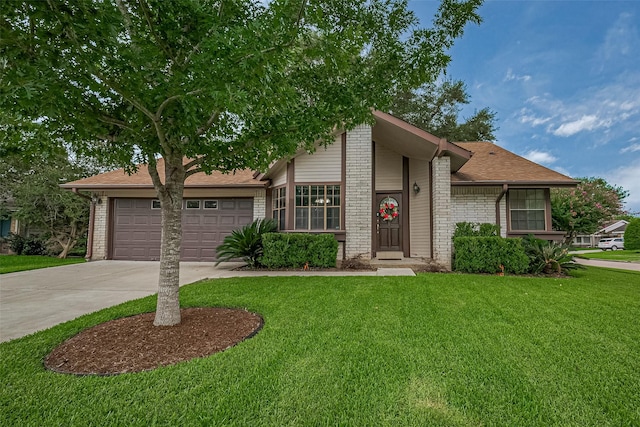 9302 Moorfield Ct, Houston, TX 77083 - view of front of property with a front lawn, concrete driveway, and brick siding