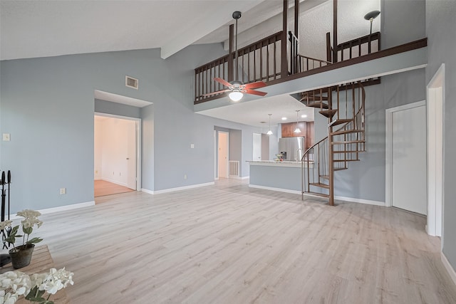 9302 Moorfield Ct, Houston, TX 77083 - unfurnished living room with high vaulted ceiling, a ceiling fan, light wood finished floors, stairs, and beamed ceiling