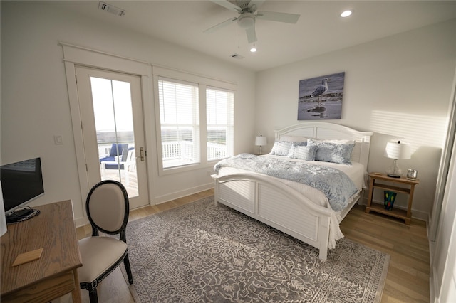 18414 Indian Beach Ct, Galveston, TX 77554 - bedroom with light wood-style floors, access to exterior, recessed lighting, and a ceiling fan