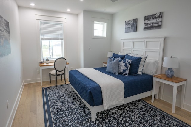 18414 Indian Beach Ct, Galveston, TX 77554 - bedroom with wood finished floors, recessed lighting, and an office area