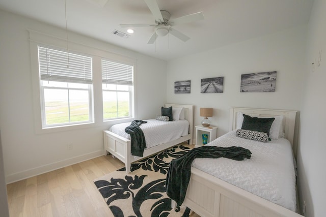 18414 Indian Beach Ct, Galveston, TX 77554 - bedroom with light wood-type flooring, recessed lighting, and ceiling fan