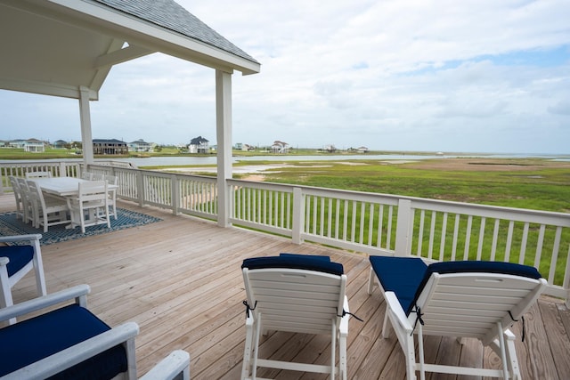 18414 Indian Beach Ct, Galveston, TX 77554 - deck featuring outdoor dining area and a water view