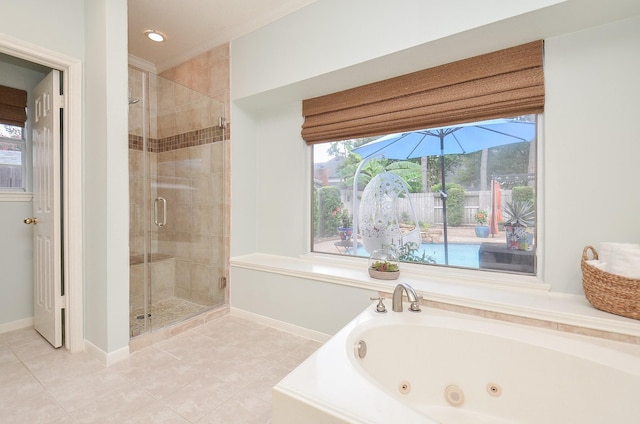 15915 Sweetwater Creek Dr, Houston, TX 77095 - full bathroom featuring a shower stall, a jetted tub, and tile patterned floors