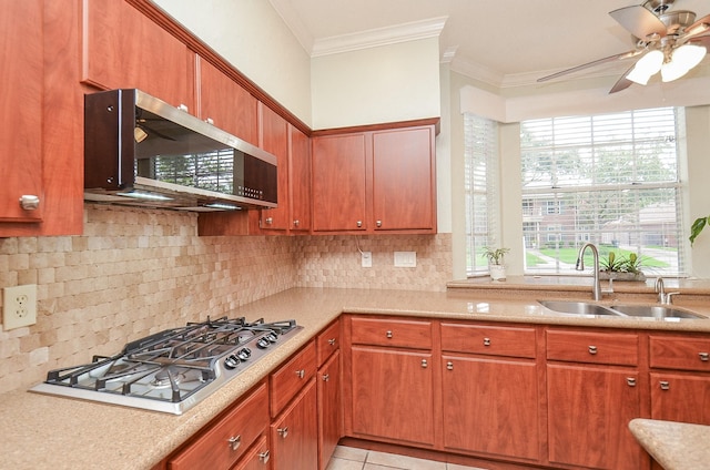 15915 Sweetwater Creek Dr, Houston, TX 77095 - kitchen with stainless steel appliances, ornamental molding, ceiling fan, decorative backsplash, and brown cabinetry