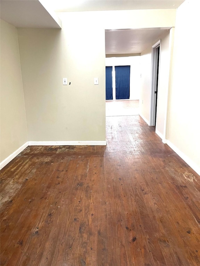 3707 12th St, Brookshire, TX 77423 - empty room with dark wood-type flooring and baseboards