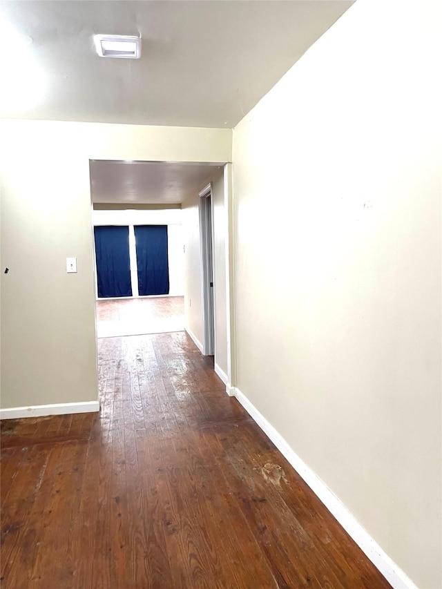 3707 12th St, Brookshire, TX 77423 - hallway featuring wood-type flooring and baseboards