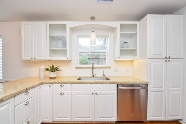 10035 Ella Lee Ln, Houston, TX 77042 - kitchen with dishwasher, white cabinetry, and glass insert cabinets
