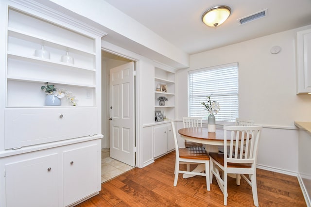 10035 Ella Lee Ln, Houston, TX 77042 - dining room featuring light wood-type flooring
