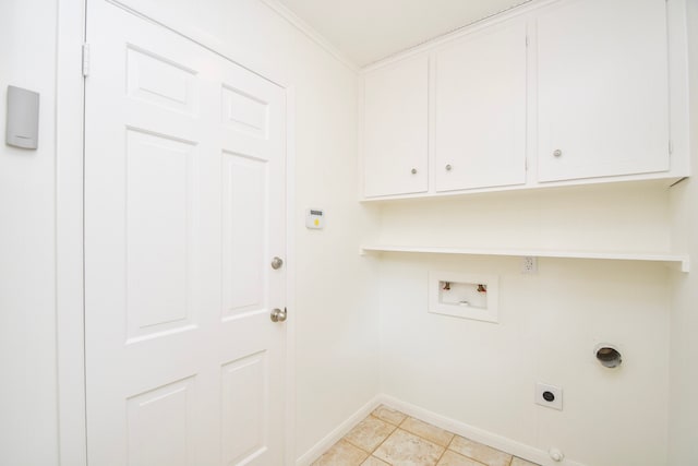 10035 Ella Lee Ln, Houston, TX 77042 - laundry room with electric dryer hookup, washer hookup, cabinet space, light tile patterned floors, and crown molding