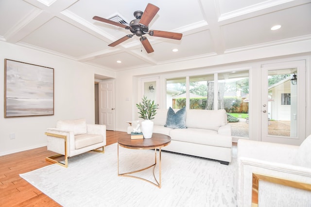 10035 Ella Lee Ln, Houston, TX 77042 - living area featuring coffered ceiling, plenty of natural light, wood finished floors, ceiling fan, and beam ceiling