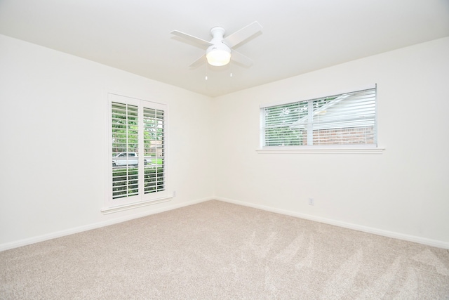 10035 Ella Lee Ln, Houston, TX 77042 - carpeted spare room with baseboards and ceiling fan
