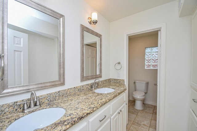 10035 Ella Lee Ln, Houston, TX 77042 - bathroom featuring double vanity and tile patterned floors