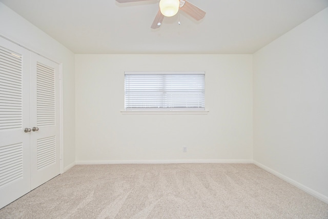 10035 Ella Lee Ln, Houston, TX 77042 - unfurnished bedroom with carpet flooring, a closet, and a ceiling fan