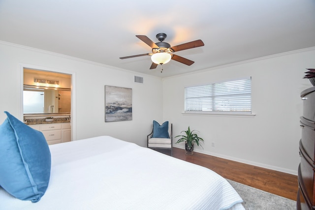 10035 Ella Lee Ln, Houston, TX 77042 - bedroom featuring wood finished floors, crown molding, ceiling fan, and ensuite bath